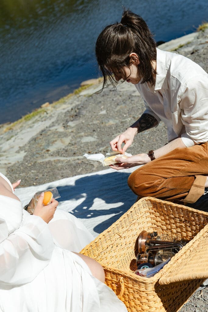 Close-up candid moment during a mountain picnic elopement in Crested Butte, showcasing storytelling elopement photography and intimate Colorado wedding inspiration.